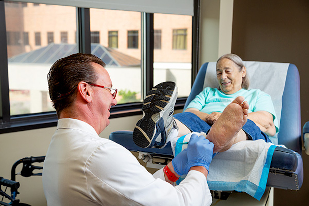Patient getting foot procedure at Wound Care Center